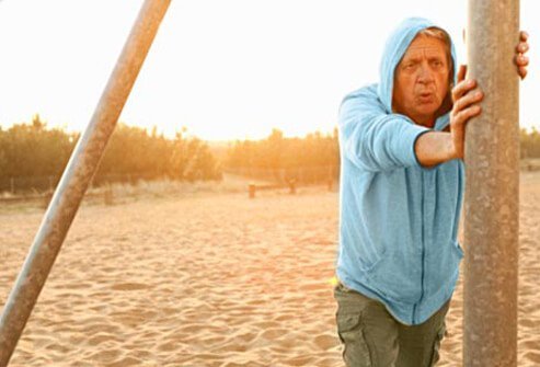 Photo of man stretching.