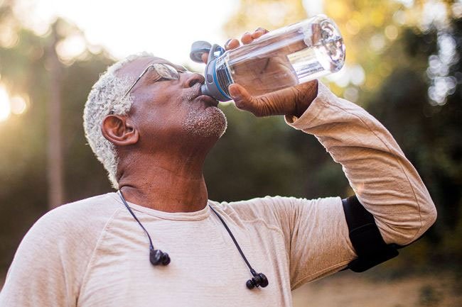 Sip water slowly so you don't overhydrate yourself. 