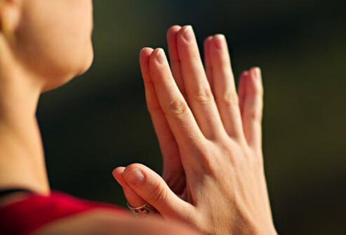 Photo of woman meditating.