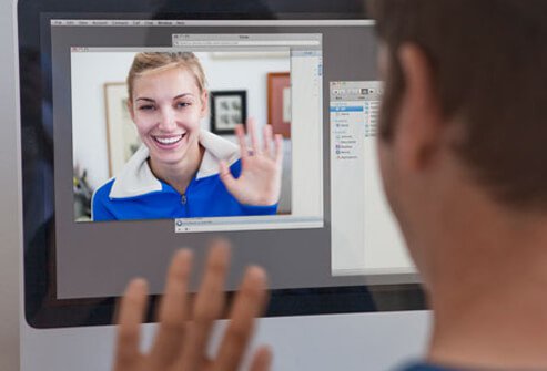 A man and woman video chatting.