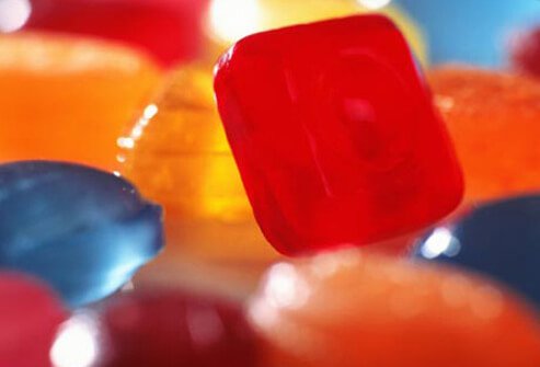 A cough drop may ease a sore throat, but many of them can make dental problems worse.