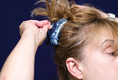 Conceal gray hair with a flattering hairstyle. 