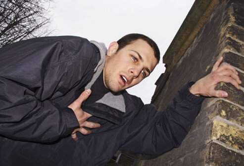 Asthma symptoms may cause someone to hunch over and speak in one word responses. 