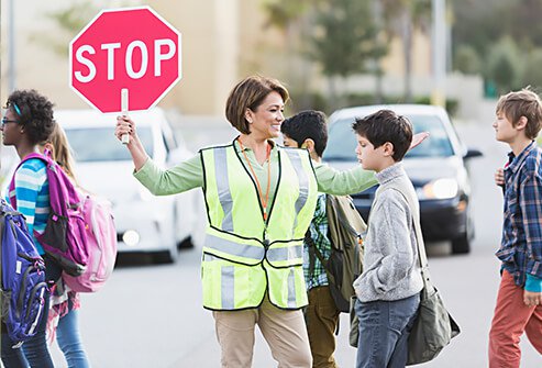 Teach your kids to safely cross the street and wait for a crossing guard. 