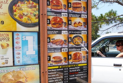 Customer ordering at a Burger King drive-thru.