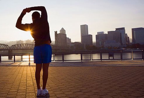 Jogger stretching for morning exercise.