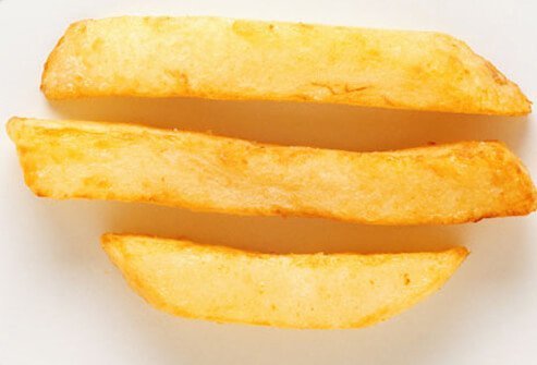Skipping the fries in favor of a low-calorie fruit or veggie side dish is an easy way to start.
