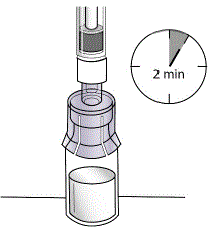 Slowly pull the plunger down to withdraw all of the
solution from the vial into the syringe  - Illustration