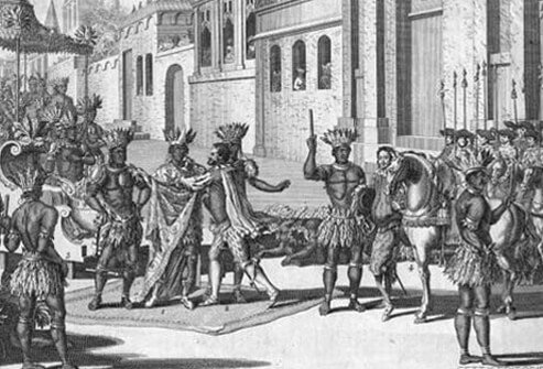 Explorer Hernan Cortes meets Emperor Montezuma II of Mexico.