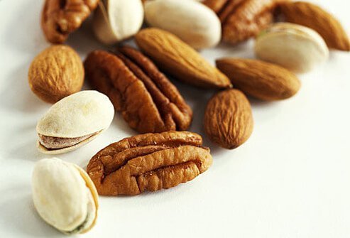 Nuts help to lower cholesterol because they are high in monounsaturated fat.