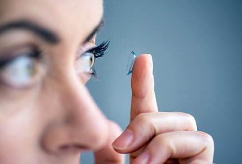 Contact lenses are thin discs made of a transparent material that fits over the cornea