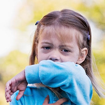 Alt TextChildren are susceptible to croup and show signs of a chronic cough as well as fever and trouble breathing.
