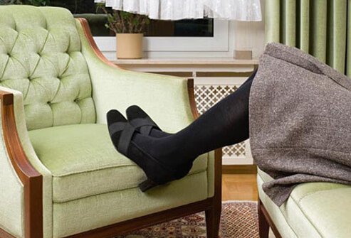 When you can, sit with your feet resting off the floor to raise your legs.