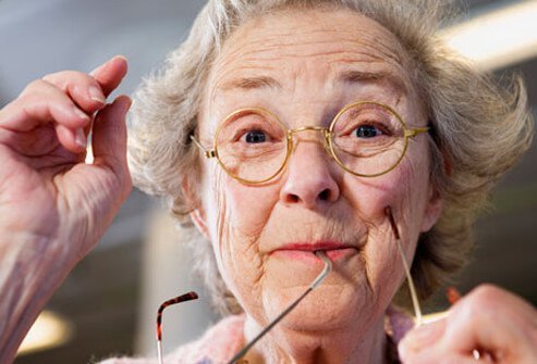 Photo of a smiling woman with dementia.