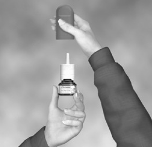 Hold the bottle as shown - Illustration Hold the bottle as shown - Illustration
