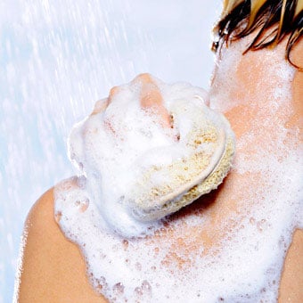 A woman showers.