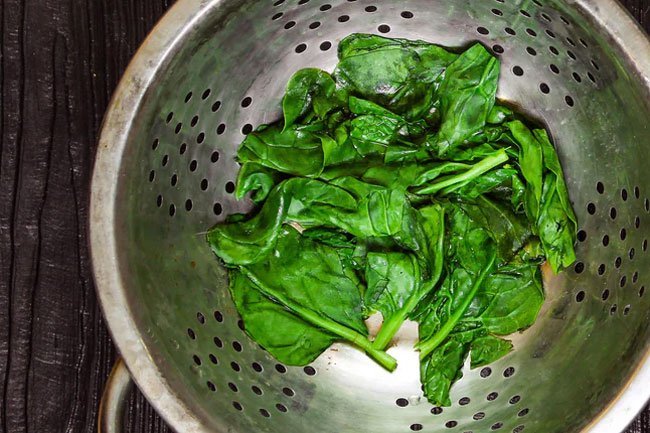 Thaw, drain, and squeeze frozen spinach before use.