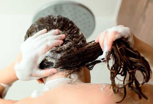 Mix a teaspoon of baking soda with your favorite shampoo to remove buildup from sprays, gels, conditioners, and other products.