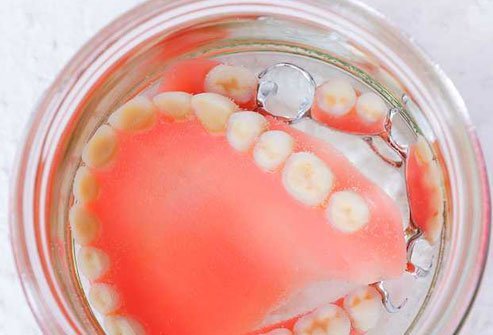 Dissolve 2 teaspoons of baking soda into a cup of warm water.