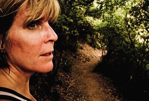 Female jogger experiencing symptoms of a heart attack.