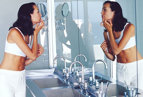 Women with PCOS may experience acne.