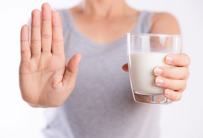 People with lactose intolerance can typically tolerate up to 12 grams of lactose. This is equal to one large cup or about 8 ounces of milk. Some can even have up to 12.5 ounces of milk without experiencing any symptoms.