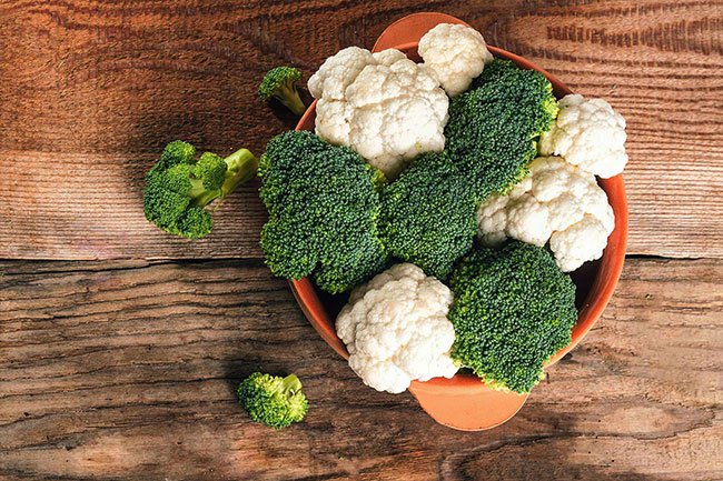 Keep broccoli and cauliflower in a drawer in the refrigerator away from other produce to keep it fresh.