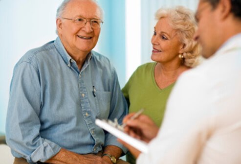 A doctor discussing the treatment progress of patient with hyperthyroidism.