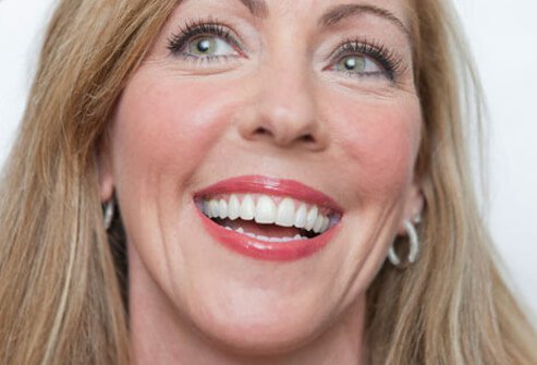 Use whitening products to get a younger-looking smile. 