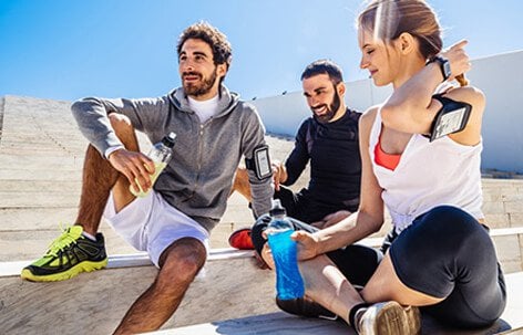 Strategies for reducing the risk of muscle cramps include varying exercise routines, staying well hydrated, and stretching.