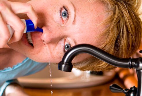 Nasal irrigation with saline solution can help relieve sinus pain and pressure.