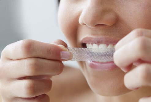 Whitening strips use peroxide to take the stains out of your teeth.