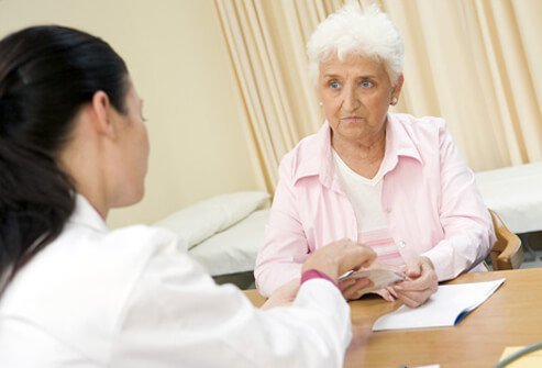 A doctor discusses osteoporosis treatment options with a patient.