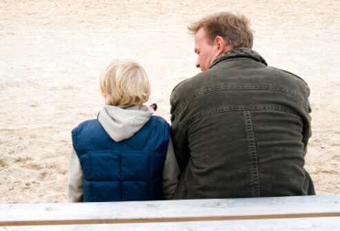 A father and son are having a serious discussion.