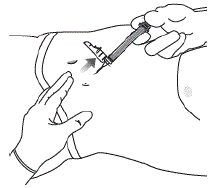 Lock the needle guard into
place by pushing it against a hard surface such as a table - Illustration