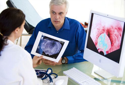 Photo of doctor discussing prostate exam results.