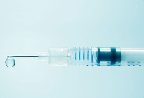 Photo of syringe with droplet, hormone therapy for prostate cancer treatment.