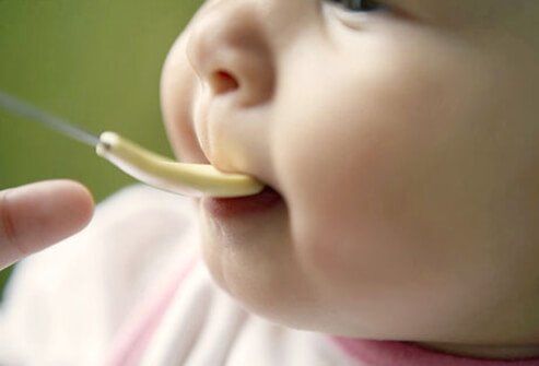 It may seem like it’s something natural, but being fed by a spoon is new to your baby.