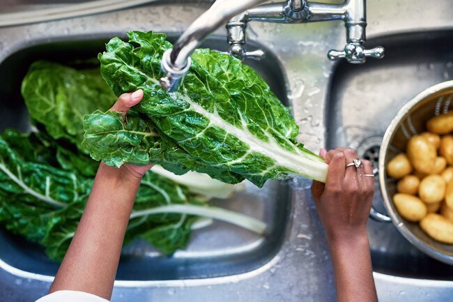 Rinse and dry your greens before putting them in the fridge.