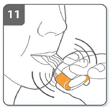 As you breathe in through the inhaler, the capsule spins around in the chamber and you should hear a whirring noise - Illustration As you breathe in through the inhaler, the capsule spins around in the chamber and you should hear a whirring noise - Illustration
