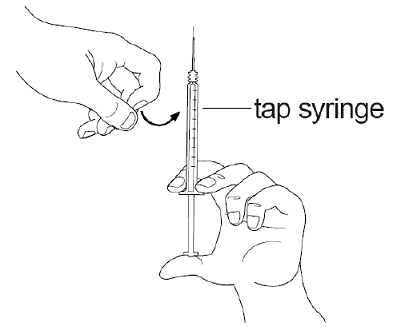 Tap the syringe with your finger to get rid of air bubbles - Illustration