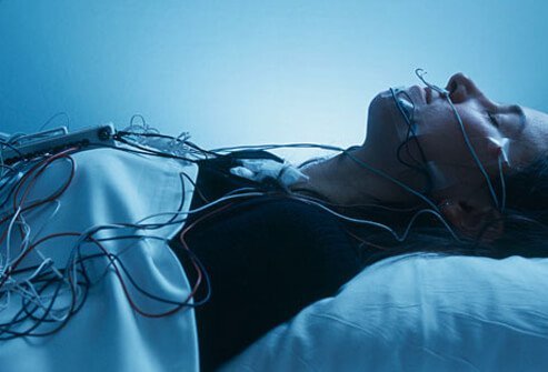 A woman participating in a sleep study.