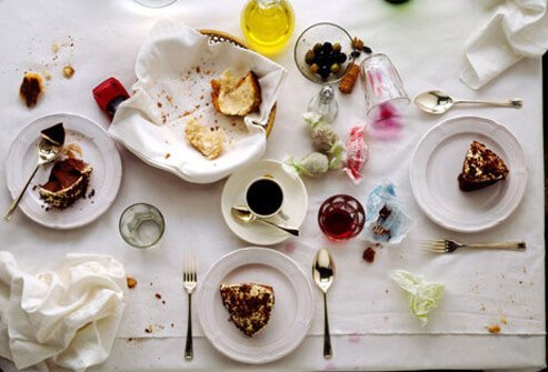 A messy table after dinner, resulting in poor sleep.