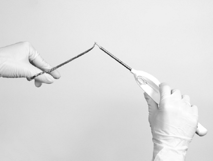 Insert the implant into the cannula of the Insertion Tool - Illustration