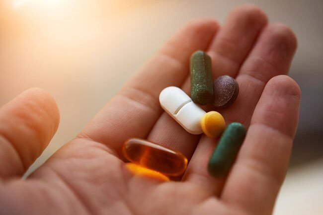 Excess B vitamins may cause urine to have an odor and change color.