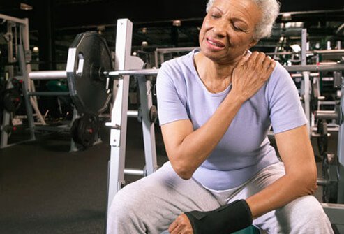 Photo of a woman with neck pain.