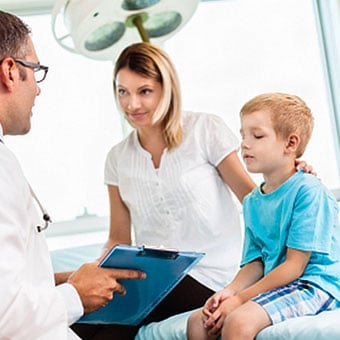 A child preparing for a tonsillectomy or adenoidectomy surgery.