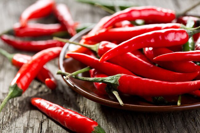 Capsaicin blocks inflammation when you take it internally, but it is also found in topical creams.