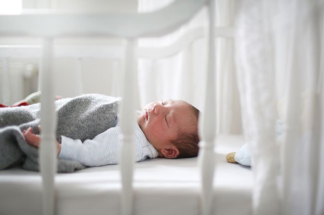 Babies should be placed on their backs to sleep to reduce the risk of suffocation. 