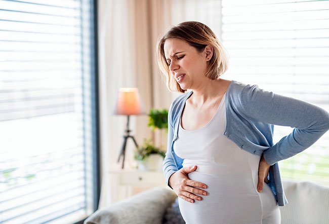Labor contractions are the tightening of a woman's uterus in order to deliver a baby. Contractions feel like a gradual tightening of the abdominal muscles followed by relaxation. Labor contractions are the tightening of a woman's uterus in order to deliver a baby. Contractions feel like a gradual tightening of the abdominal muscles followed by relaxation.